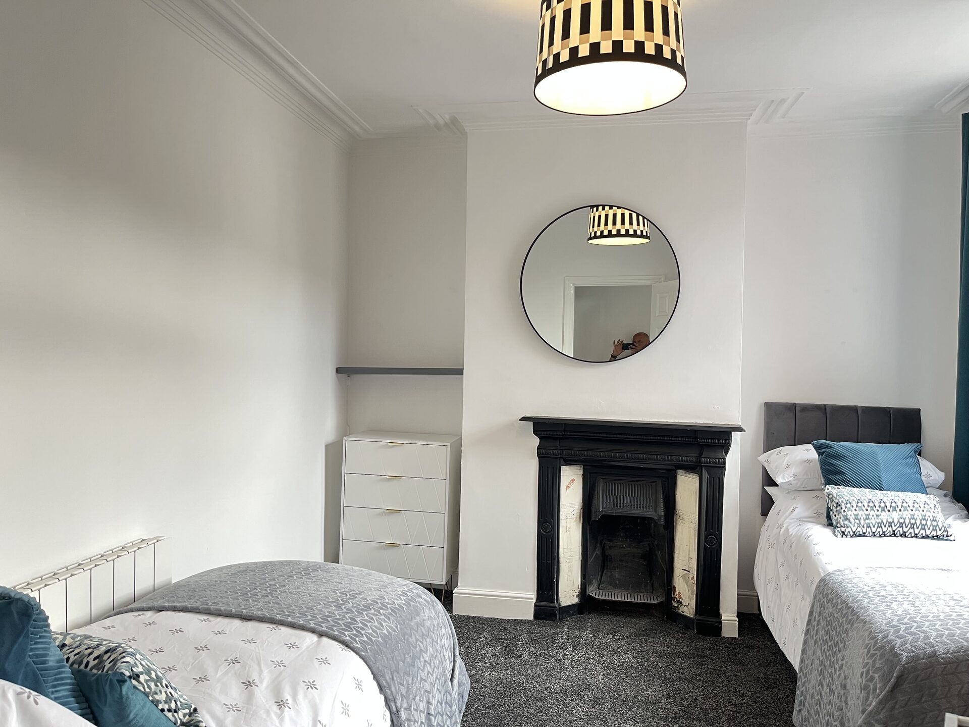 Twin bedroom with cast-iron fireplace at The Aberdeen House, Floor 2