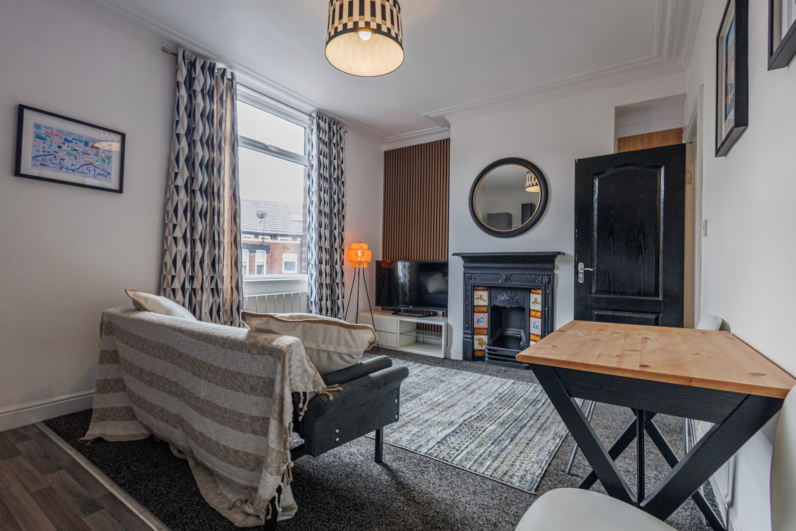 Lounge with mirror and fireplace at The Aberdeen House, Floor 2