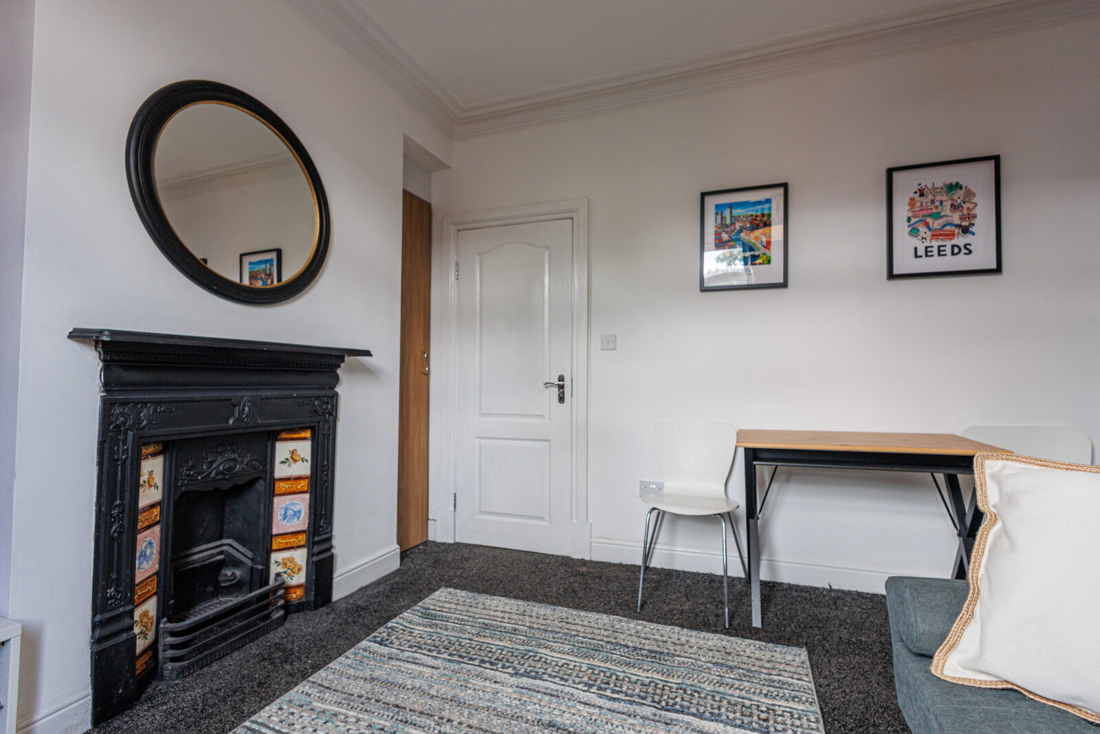 Desk and reading corner by the fireplace at The Aberdeen House, Floor 2